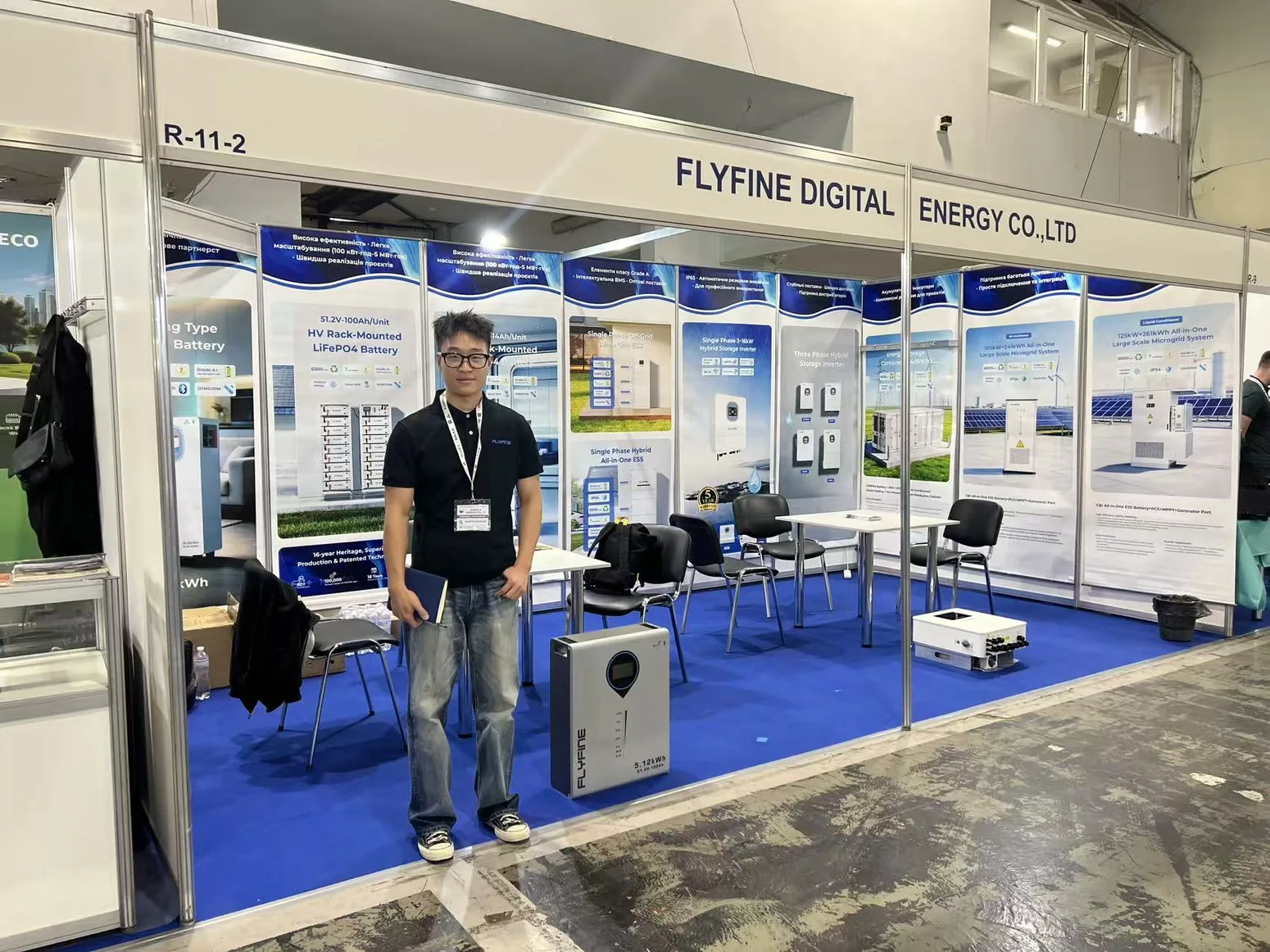 FLYFINE representative at EcoEnergy Expo 2026 Ukraine exhibition booth